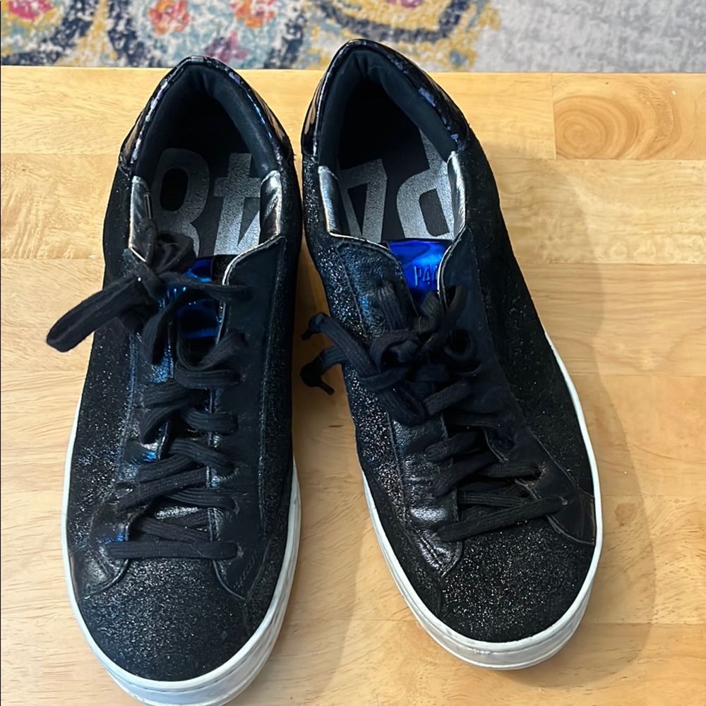 P448 John low-top sneakers in a black glitter finish. Size 38